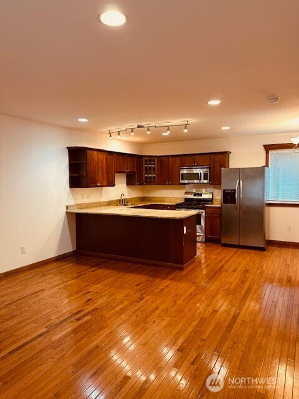 Photo of 6829 Weedin Place Pl NE, Seattle, WA 98115 (MLS # 2399109)