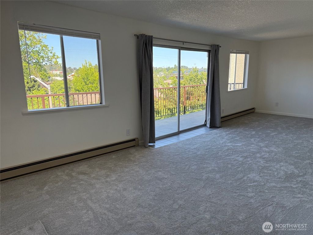 Photo of 9030 Seward Park Avenue S #500, Seattle, WA 98118 (MLS # 2407788)
