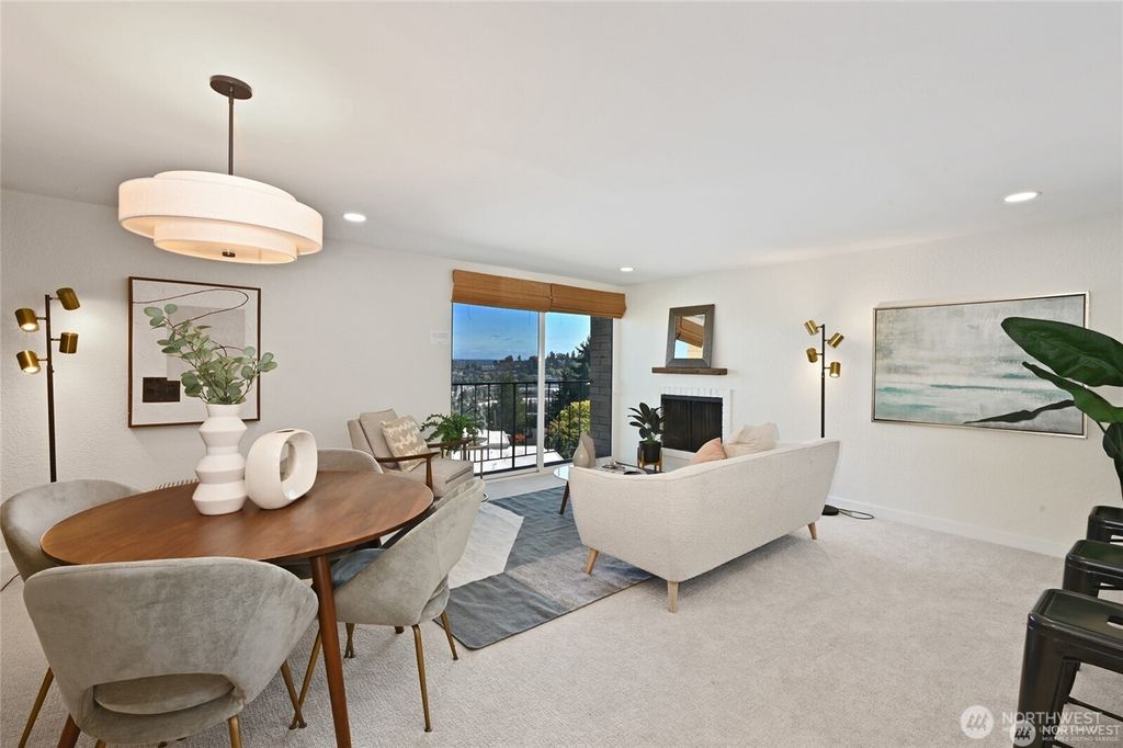 Photo of 3710 25th Place W #405, Seattle, WA 98199 (MLS # 2485800)