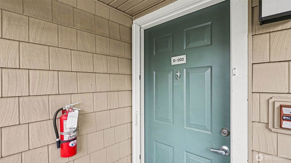 Photo of 1500 S 18th St St #D202, Renton, WA 98055 (MLS # 2483190)