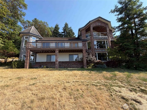Photo of 811 FOX HOLLOW Road, Sequim, WA 98382 (MLS # 2590334)
