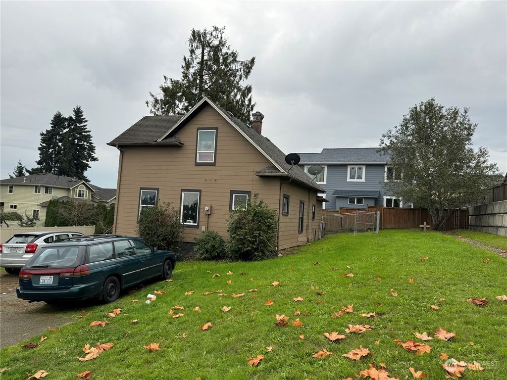 Photo of 4803 S 144th Street, Tukwila, WA 98168 (MLS # 2251372)