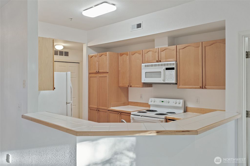 Photo of 12122 NE 171st Place #D201, Bothell, WA 98011 (MLS # 2504485)