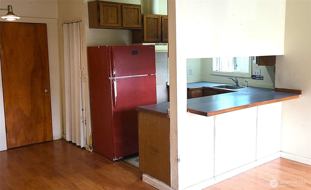Photo of 529 N 103rd Street, Seattle, WA 98133 (MLS # 2425317)