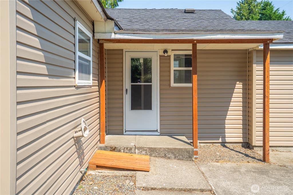 Photo of 9802 35th Avenue SW, Seattle, WA 98126 (MLS # 2551577)