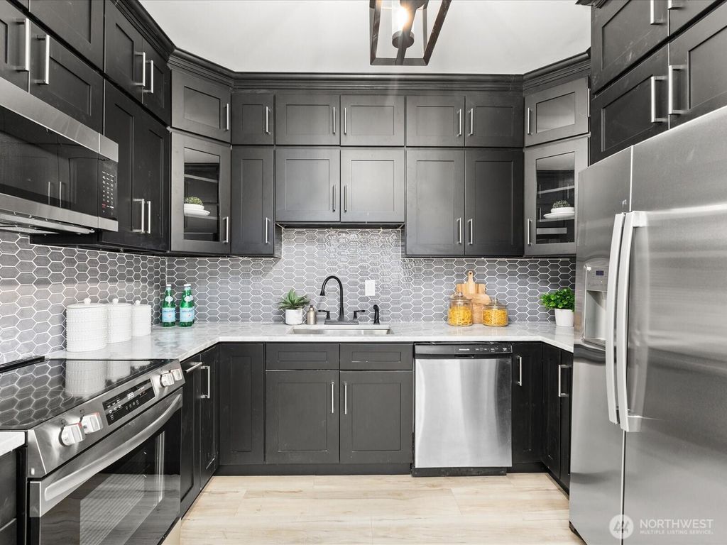 Photo of 6215 Woodlawn Avenue N, Seattle, WA 98103 (MLS # 2347639)