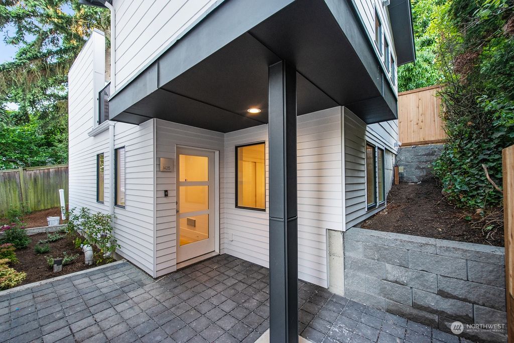 Photo of 1425 Madrona Drive, Seattle, WA 98122 (MLS # 2130536)