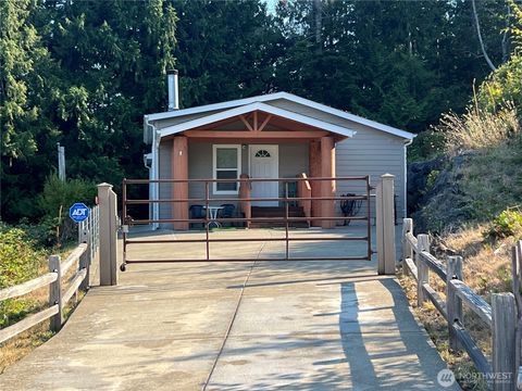 Photo of 61 Nevergiveup Road, Brinnon, WA 98320 (MLS # 2526378)