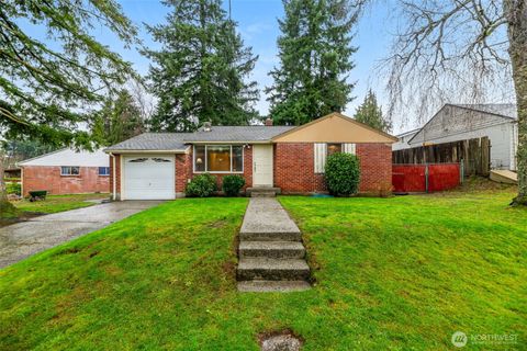 Photo of 11469 37th Avenue SW, Seattle, WA 98126 (MLS # 2486684)
