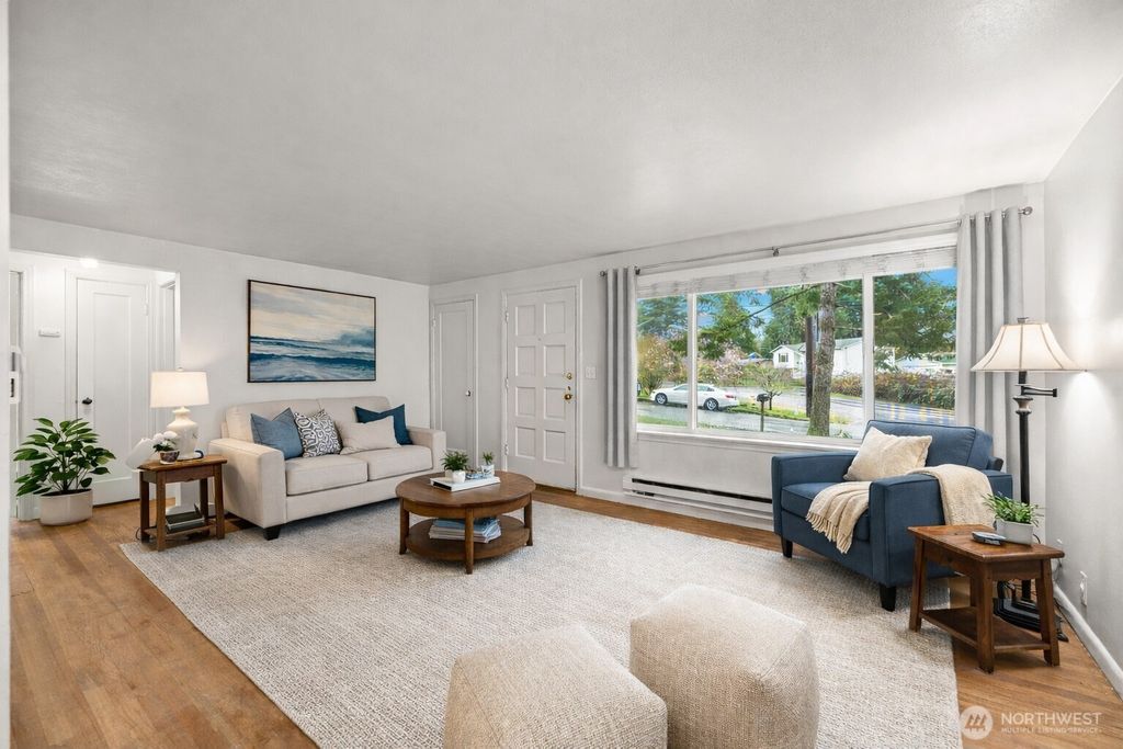 Photo of 11469 37th Avenue SW, Seattle, WA 98146 (MLS # 2486684)