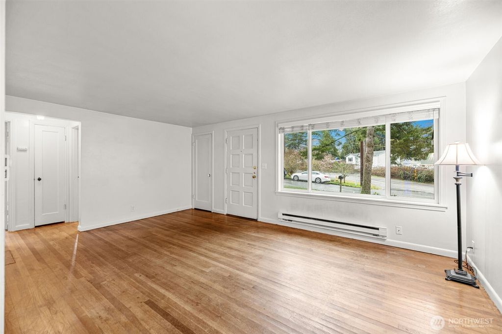 Photo of 11469 37th Avenue SW, Seattle, WA 98146 (MLS # 2486684)