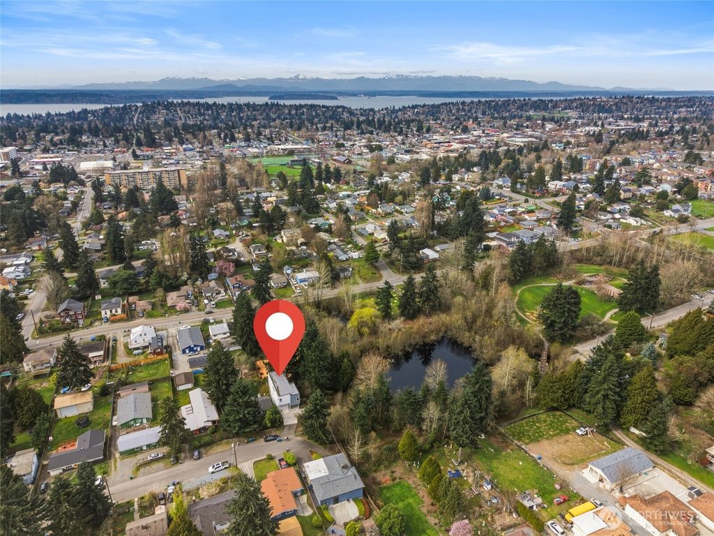 Photo of 10429 7th Avenue SW, Seattle, WA 98146 (MLS # 2497152)