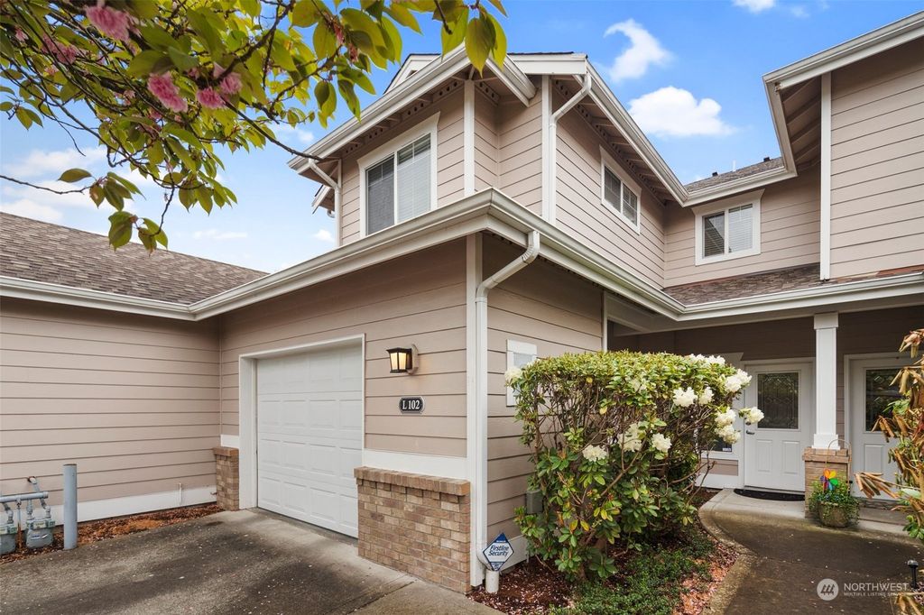 Photo of 10700 SE 260th Street #L102, Kent, WA 98030 (MLS # 2231863)