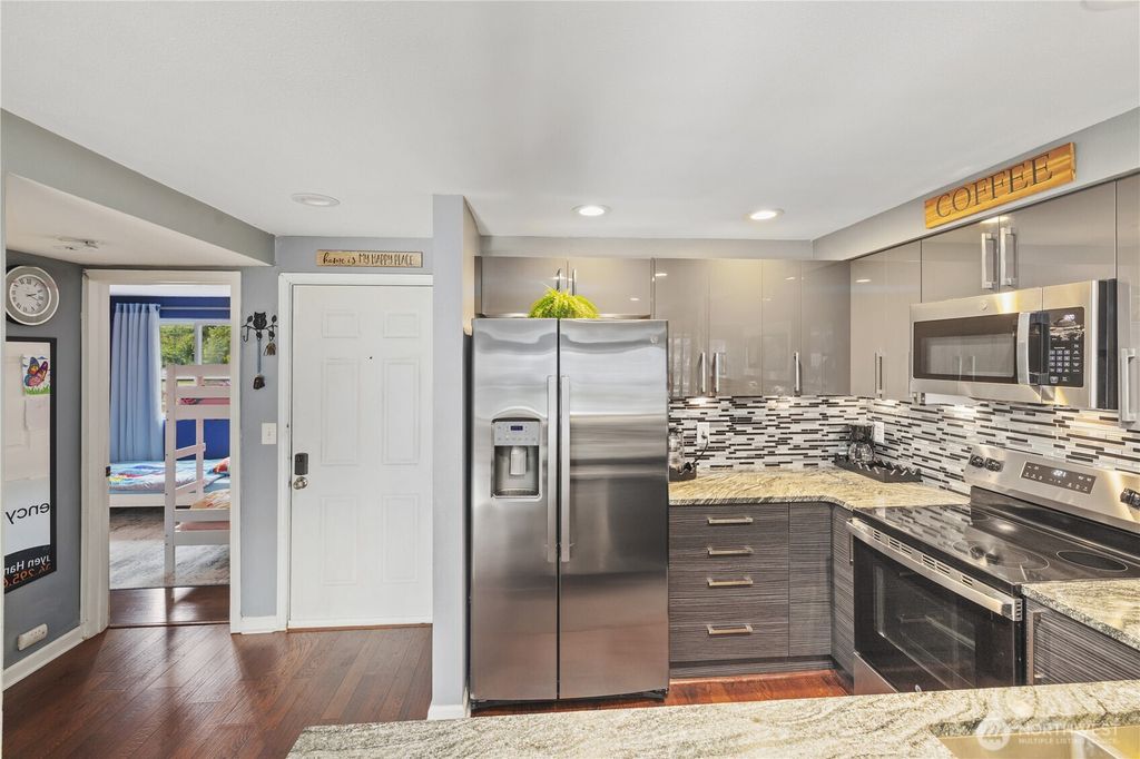 Photo of 26205 116th Avenue SE #A-203, Kent, WA 98030 (MLS # 2475425)