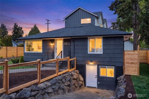 Photo of 3402 48th Avenue SW, Seattle, WA 98116 (MLS # 2521028)