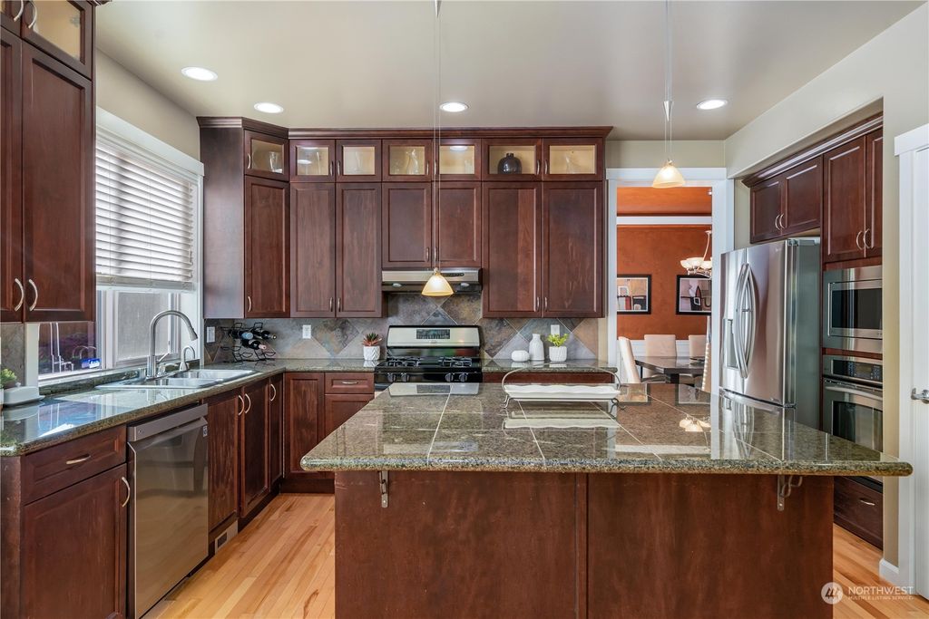 Photo of 12925 SE 216th Place, Kent, WA 98031 (MLS # 2014658)