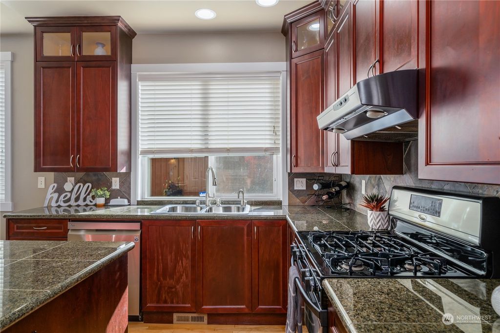 Photo of 12925 SE 216th Place, Kent, WA 98031 (MLS # 2014658)