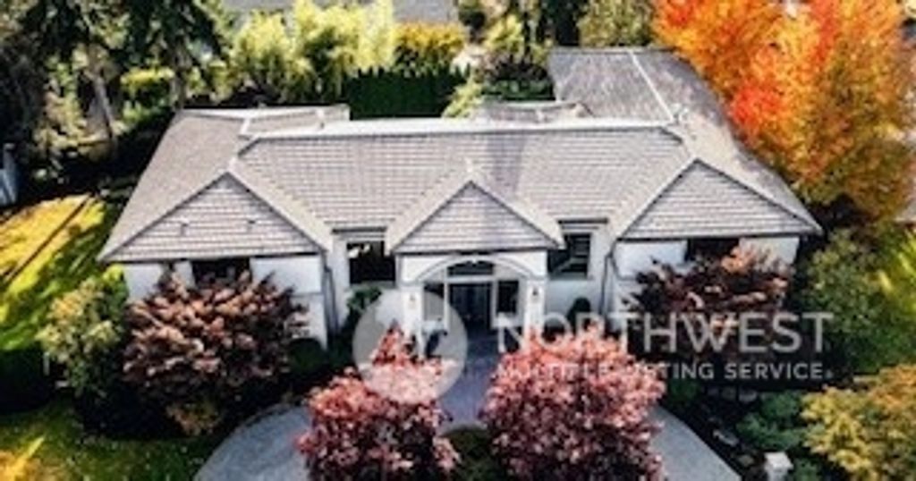 Photo of 8245 NE 26th St, Medina, WA 98039 (MLS # 2218070)