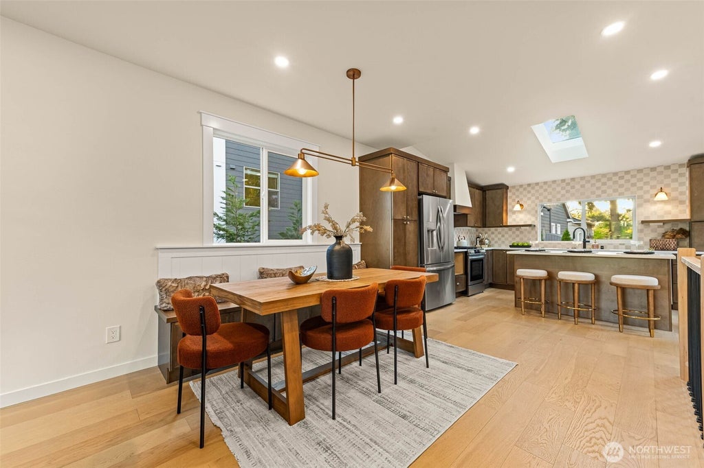 Photo of 7707 6TH Avenue NW, Seattle, WA 98117 (MLS # 2583731)