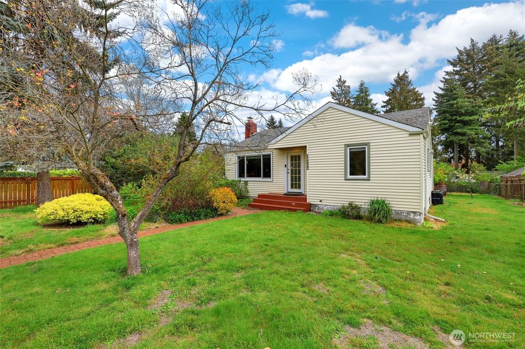 Photo of 11406 12th Avenue SW, Seattle, WA 98146 (MLS # 2511775)