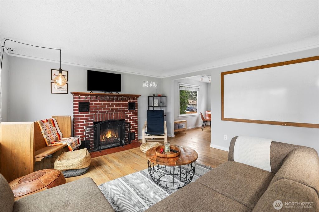 Photo of 11406 12th Avenue SW, Seattle, WA 98146 (MLS # 2511775)