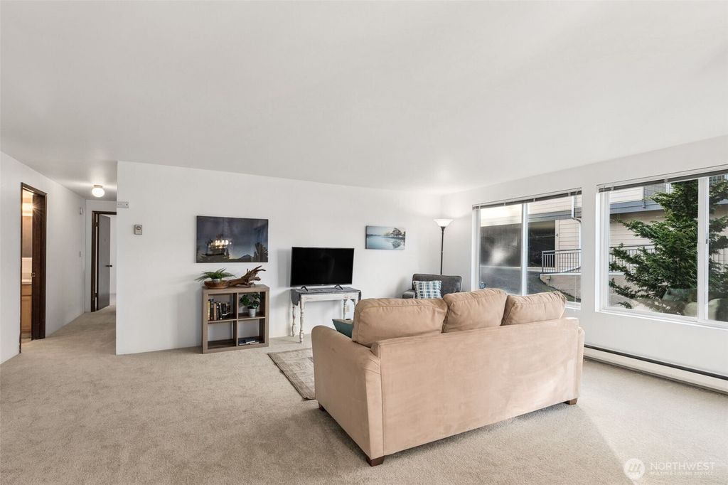 Photo of 3825 NE 155th Place #201, Lake Forest Park, WA 98155 (MLS # 2334055)