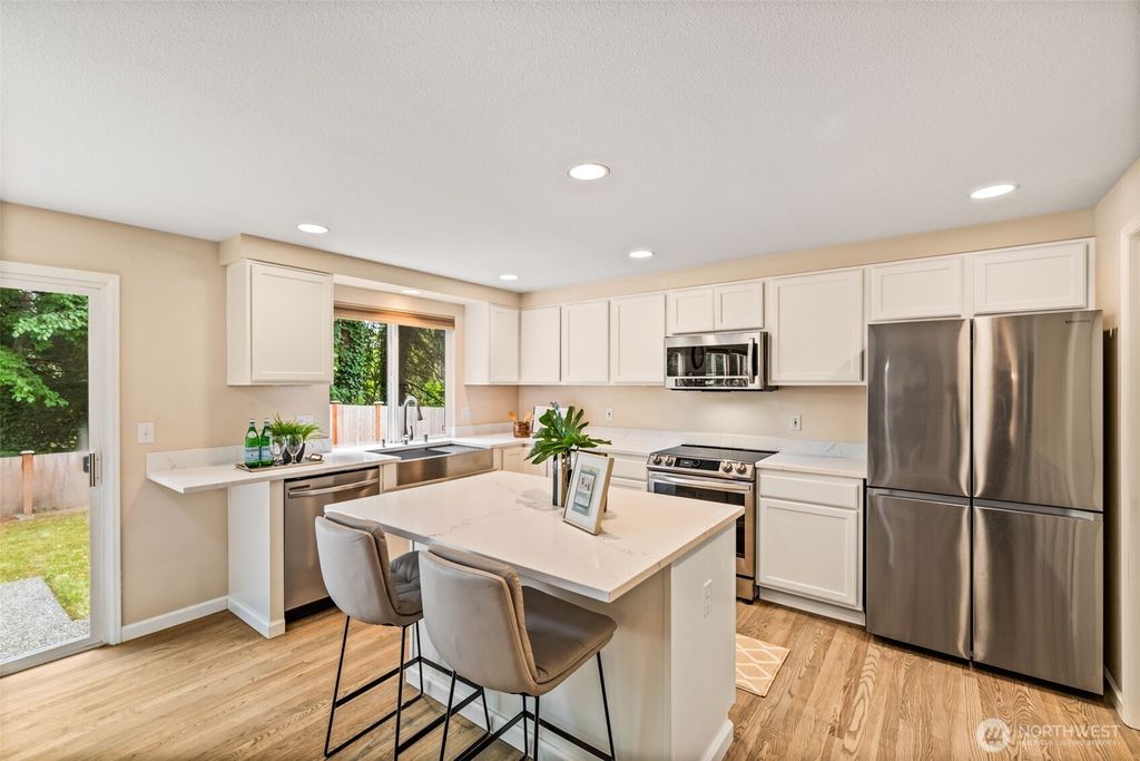 Photo of 12856 SE 175th Court, Renton, WA 98058 (MLS # 2418763)