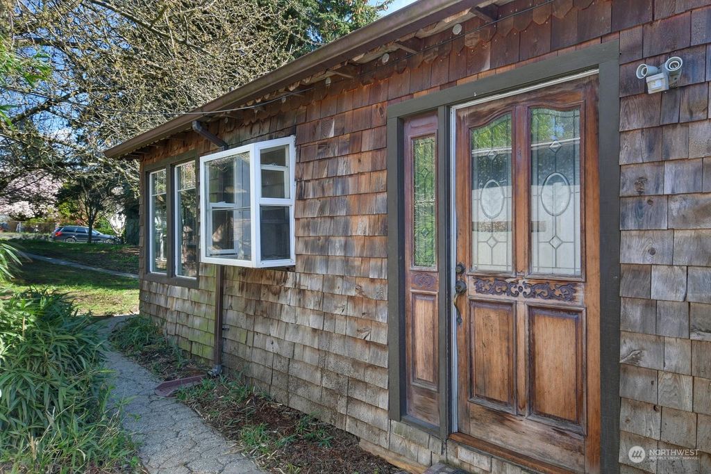 Photo of 8627 30th Avenue SW, Seattle, WA 98126 (MLS # 2056249)