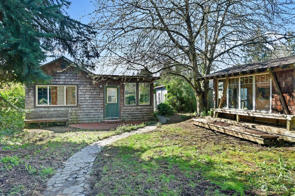 Photo of 8627 30th Avenue SW, Seattle, WA 98126 (MLS # 2056249)