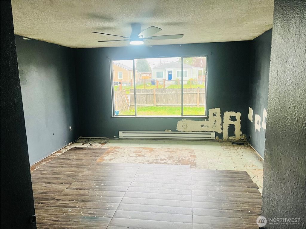 Photo of 1001 E 60th Street, Tacoma, WA 98404 (MLS # 2457685)