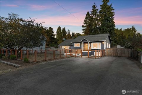 Photo of 11086 25th Avenue SW, Seattle, WA 98146 (MLS # 2417460)