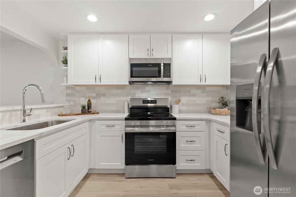 Photo of 12760 NE 10th Place #F301, Bellevue, WA 98005 (MLS # 2468533)