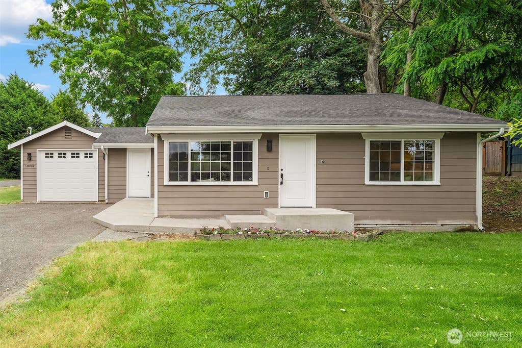 Photo of 10902 26th Avenue SW, Seattle, WA 98146 (MLS # 2553631)