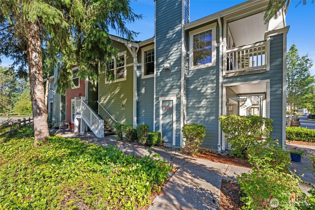 Photo of 10500 NE 221st Lane #202, Redmond, WA 98053 (MLS # 2405906)