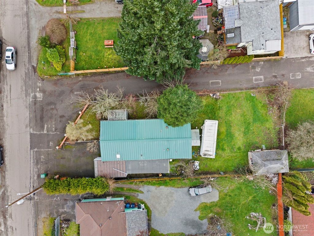 Photo of 11040 14th Avenue SW, Seattle, WA 98146 (MLS # 2508478)