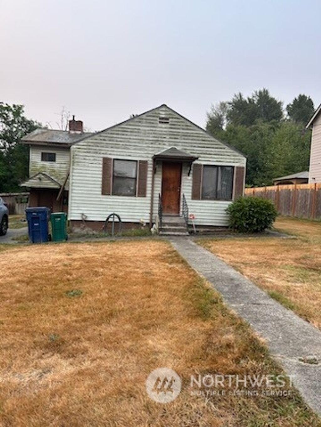 Photo of 4821 S 136th Street, Tukwila, WA 98168 (MLS # 2160580)