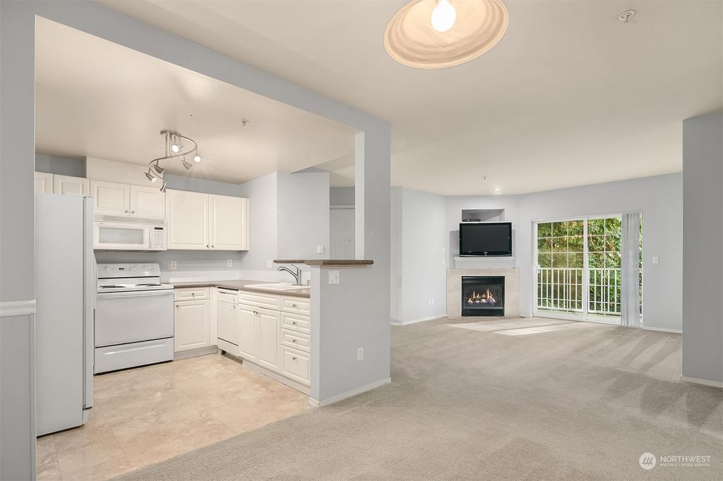 Photo of 14714 Admiralty Way #B205, Lynnwood, WA 98087 (MLS # 2215977)