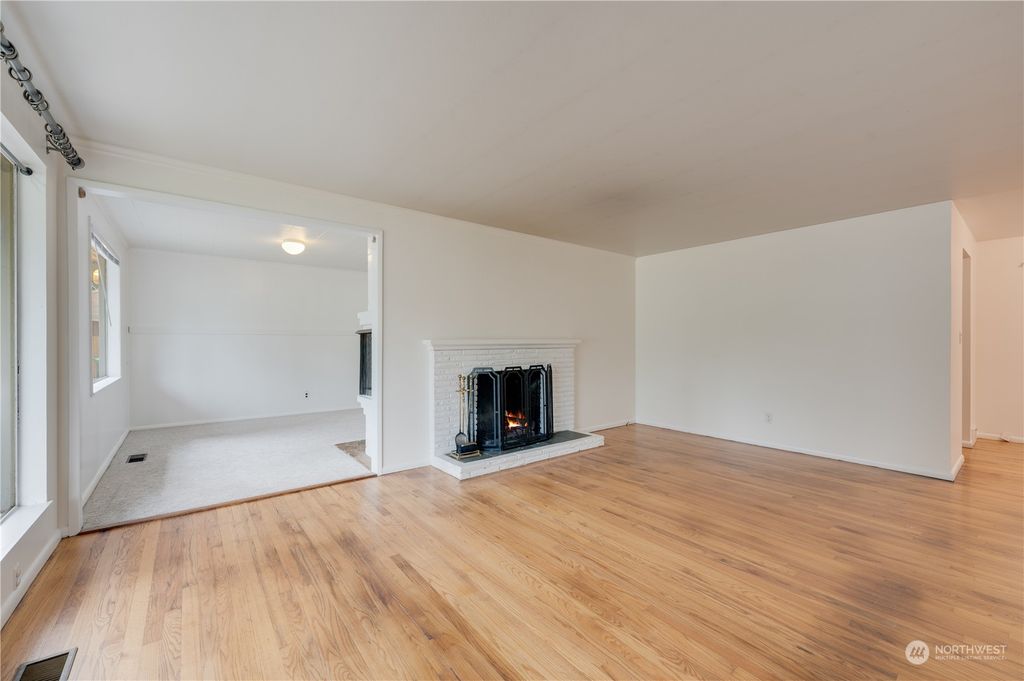 Photo of 1402 N 136th Street, Seattle, WA 98133 (MLS # 2286287)