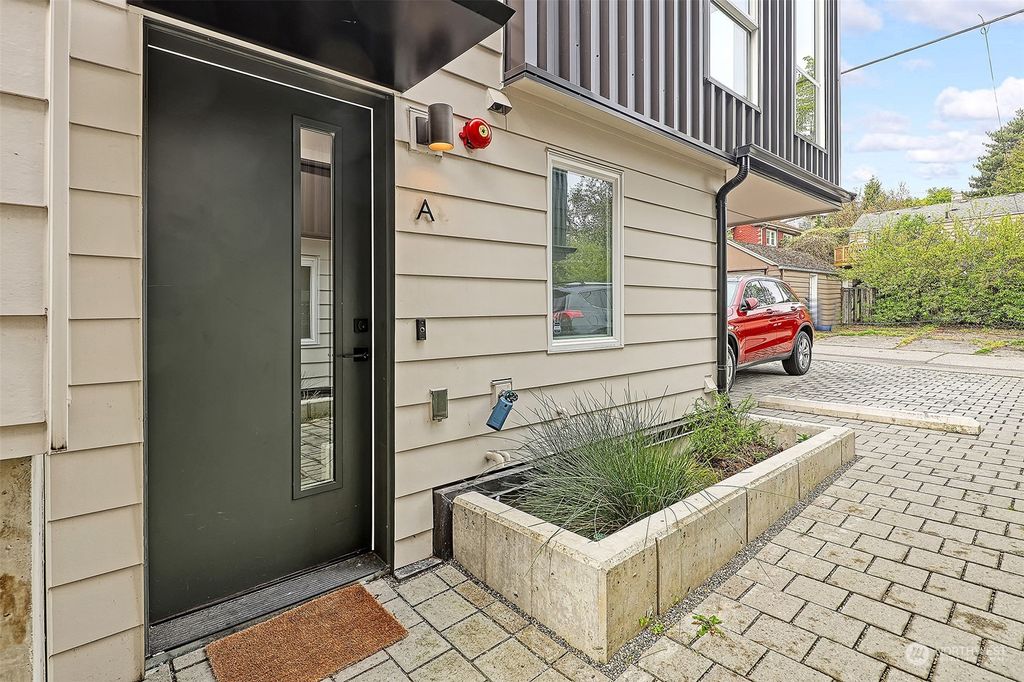 Photo of 3104 SW Avalon Way #A, Seattle, WA 98126 (MLS # 2063516)