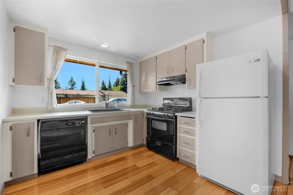 Photo of 5227 101st Place NE, Marysville, WA 98270 (MLS # 2410737)