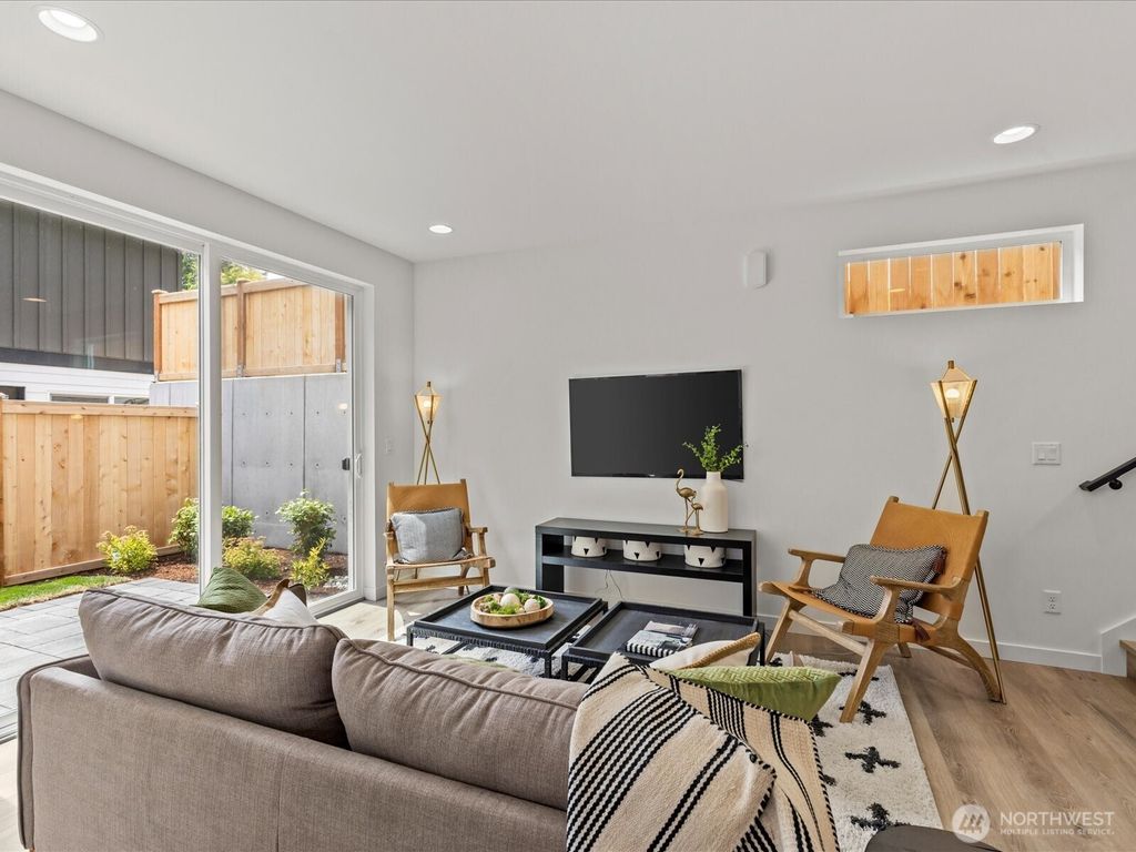 Photo of 9015 Dibble Avenue NW #B, Seattle, WA 98117 (MLS # 2407068)