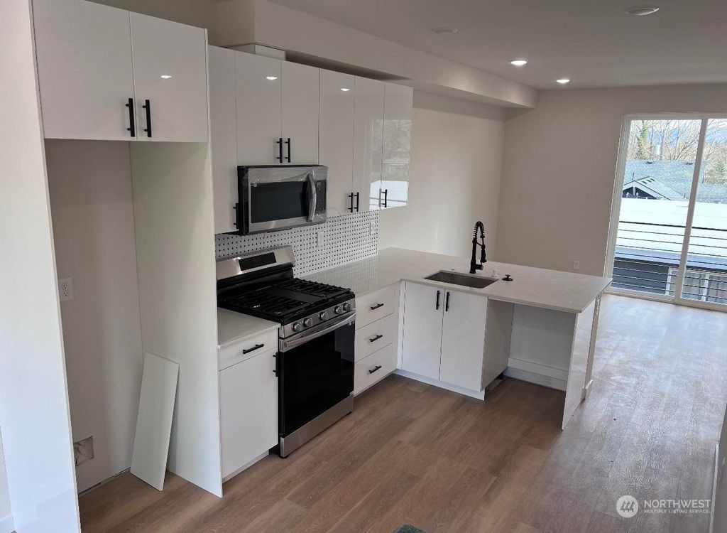 Photo of 9318 Renton Avenue S, Seattle, WA 98118 (MLS # 2034183)