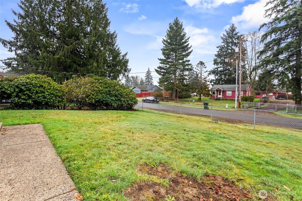 Photo of 10621 S 12th Avenue Ct S, Tacoma, WA 98444 (MLS # 2475699)