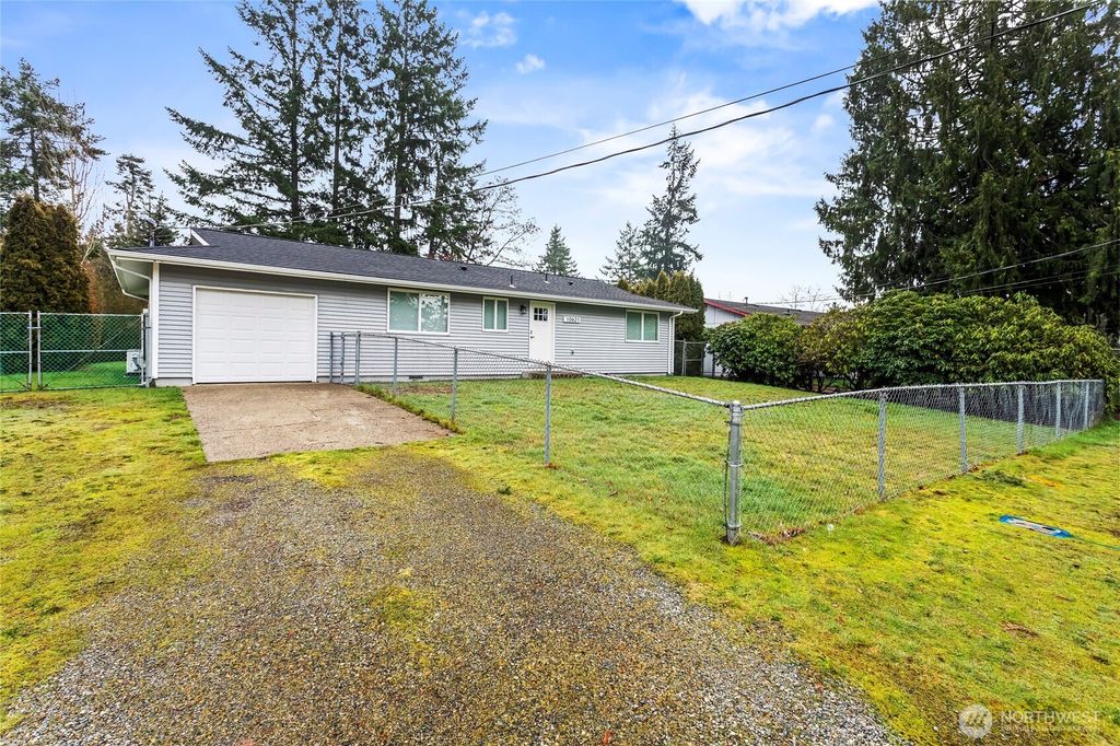Photo of 10621 S 12th Avenue Ct S, Tacoma, WA 98444 (MLS # 2475699)