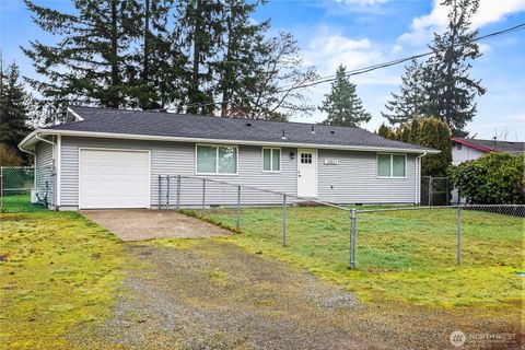 Photo of 10621 S 12th Avenue Ct S, Tacoma, WA 98444 (MLS # 2475699)