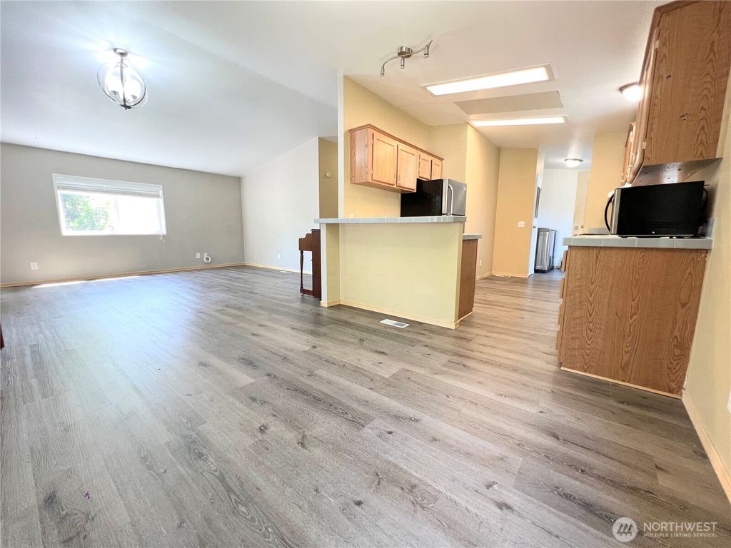 Photo of 11029 SE 227th Place, Kent, WA 98031 (MLS # 2395334)