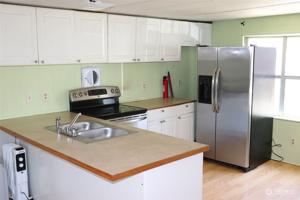 Photo of 22013 30th Avenue S #20, Des Moines, WA 98198 (MLS # 2257585)