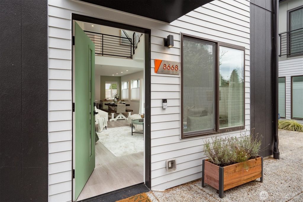 Photo of 8668 13th Avenue NW, Seattle, WA 98117 (MLS # 2336718)