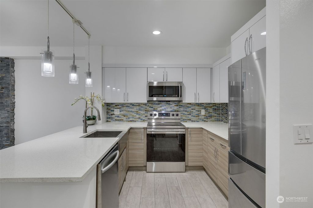 Photo of 19500 Ballinger Way NE #103, Shoreline, WA 98155 (MLS # 2029812)