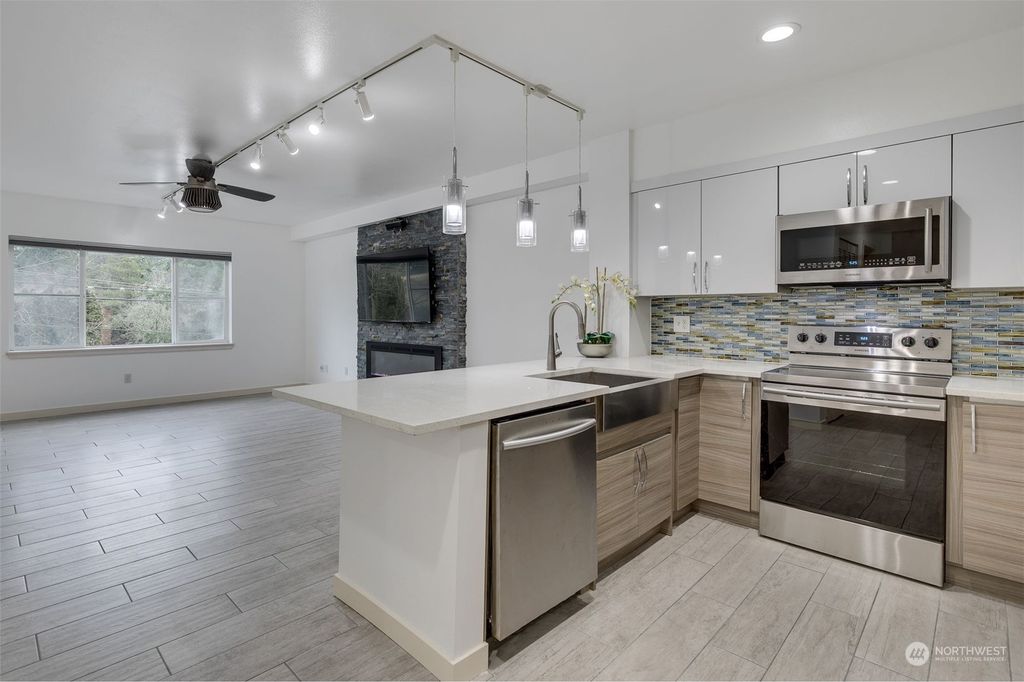 Photo of 19500 Ballinger Way NE #103, Shoreline, WA 98155 (MLS # 2029812)